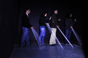 Picture of a group with white canes entering the dark in Mexico