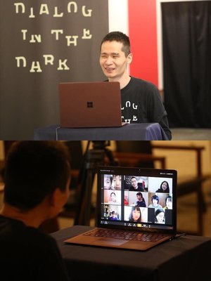 Photo of Hiyama in a video chat with some school kids.
